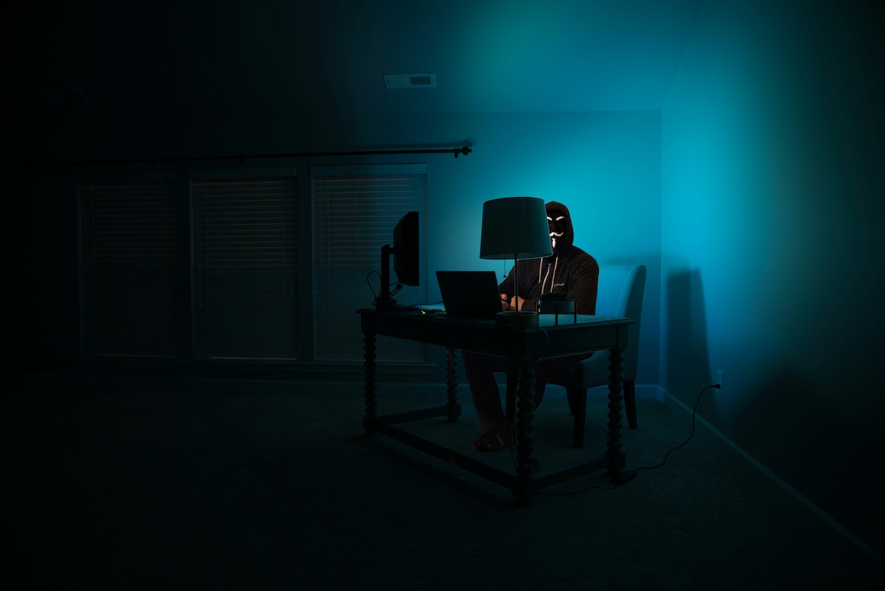A hacker using AI for a cyberattack